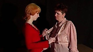 Redhead white lady and mature brunette woman undress and play with each other in the dark