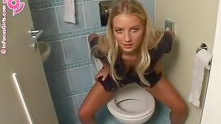 Beautiful Girl Taking A Piss In The Toilet.