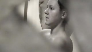 Black and white shower cam vid with no panty and topless gal