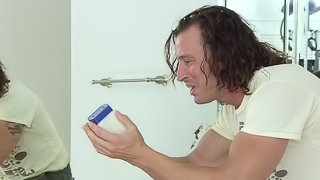 A couple gets out the lotion and has a slippery good time fucking