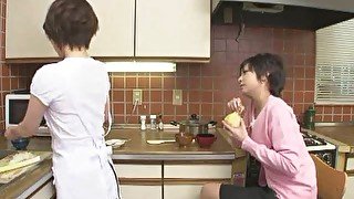 Japanese lesbians fool around in the kitchen