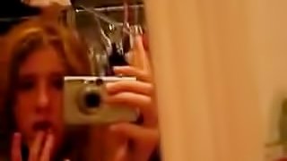 Kinky teen films herself while masturbating her pussy