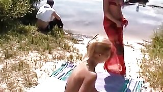 Blond cutie exposed at the beach