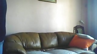 Dark haired girl makes a sextape with her bf on the sofa