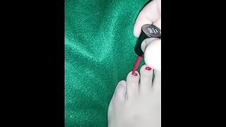 Painting toe nails fetish
