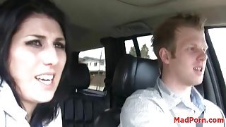 Couple in the car films their chatty fun