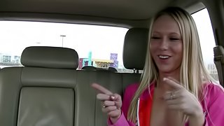 Naked blonde in the back of the car talks about sex