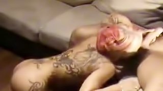 Amazing tattooed blonde blows cock and swallows cum