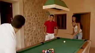 Sizzling babe gets fucked by two on the pool table