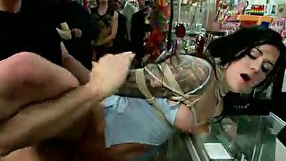 Tattooed brunette sexpot gets brutally fucked in a public place