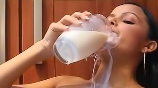Teen pours milk down her tight body