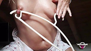 nippleringlover horny milf inserting clothes hanger through extreme stretched nipple piercings