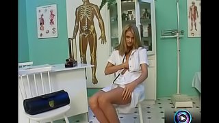 Foxy nurse rubbing her doctor's stethoscope