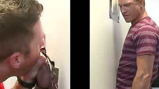 A queer sucks a dick through a gloryhole and enjoys sex in cowboy pose