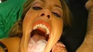 Blonde with red lips swallows some juice