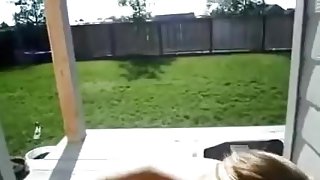 Cute cutie gives a backyard oral-service