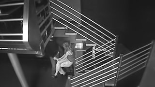 Horny Couple Getting Caught On Camera Fucking On A Stair Case