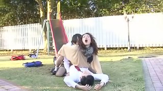 Horny Megumi Shino sucks one cock and rides another one outdoors