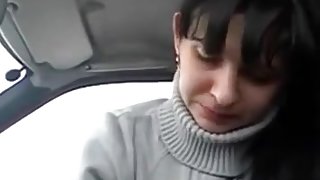 Streetslut sucks and jerks me off in my car, shows off the cum in her mouth and spits it out.
