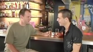 Two horny guys fucking in a bar