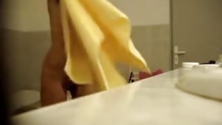 Shower spy cam fem zealously towels her naked body