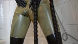 Young Latex Fetish Girl Fully Rubberized With Pisspants And Gasmask