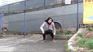 Girl has to piss badly so she goes in public