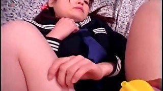 Pigtailed Japanese teen fucked in hairy cunt