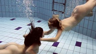 Iva Brizgina and Paulinka hot softcore lesbians in the pool