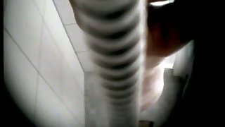 Mature woman washing her pussy on shower spy cam