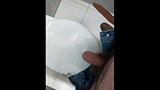 Masturbation on the toilet in the mall