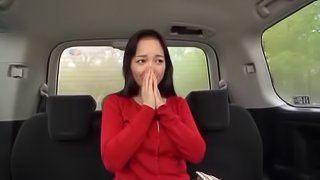 Flirtatious Asian brunette has her cunt teased with a vibrator in the back of a van