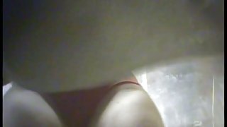 Milfs demonstrate their tits and thighs to a hidden cam in the girls dressing room
