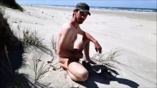 Exhibtionist jerking at the beach