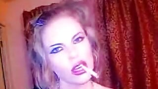 Sassy blonde smokes a cigarette in homemade solo clip