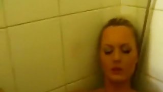 Lusty blonde gets naughty in the shower
