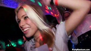 Kinky whores go wild in the club and kneel down to give blowjobs for cum