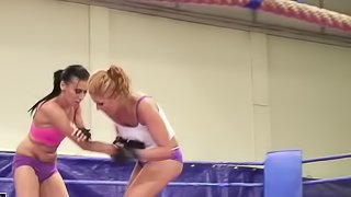 Barbie Black and Becky Stevens beat each other on a ring
