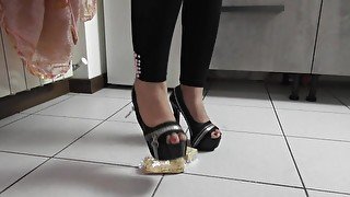 Crushing crackers in high heels (visual 2)