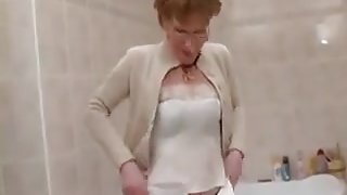 Sexy mature shows her pussy and nice nips
