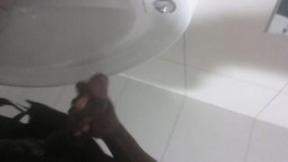 Horny jamaican cum in public toilet at work