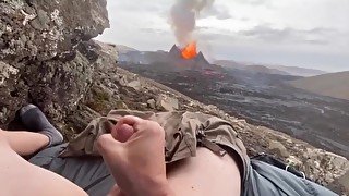 The guy masturbates to the eruption of the volcano, and then his cock spews sperm