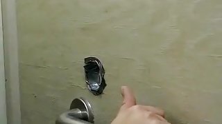 Chubby lady enjoys a dick poking from a hole in the wall