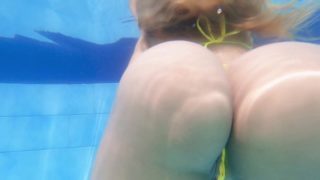 Sexy blonde masturbates in a public pool TRAILER