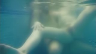 Underwater lesbian sex with a couple of teen hotties in the pool