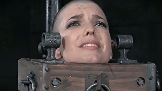 Caged chick Endza watches her bald pal Abigail Dupree getting tortured tough