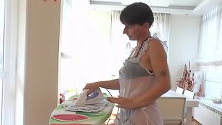 Housewife drops her iron and gets down to business masturbating