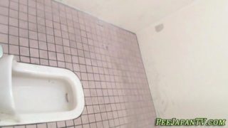 Oriental skank peeing in toilet