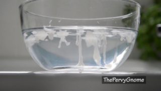 Cum in a bowl of water with time lapse