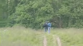 Amateur couple secretly filmed while fucking in a field